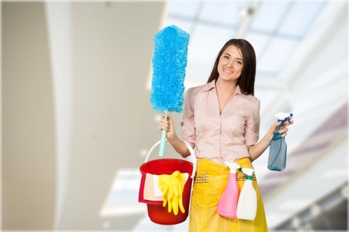 Professional carpet cleaner inspecting a room for safety hazards
